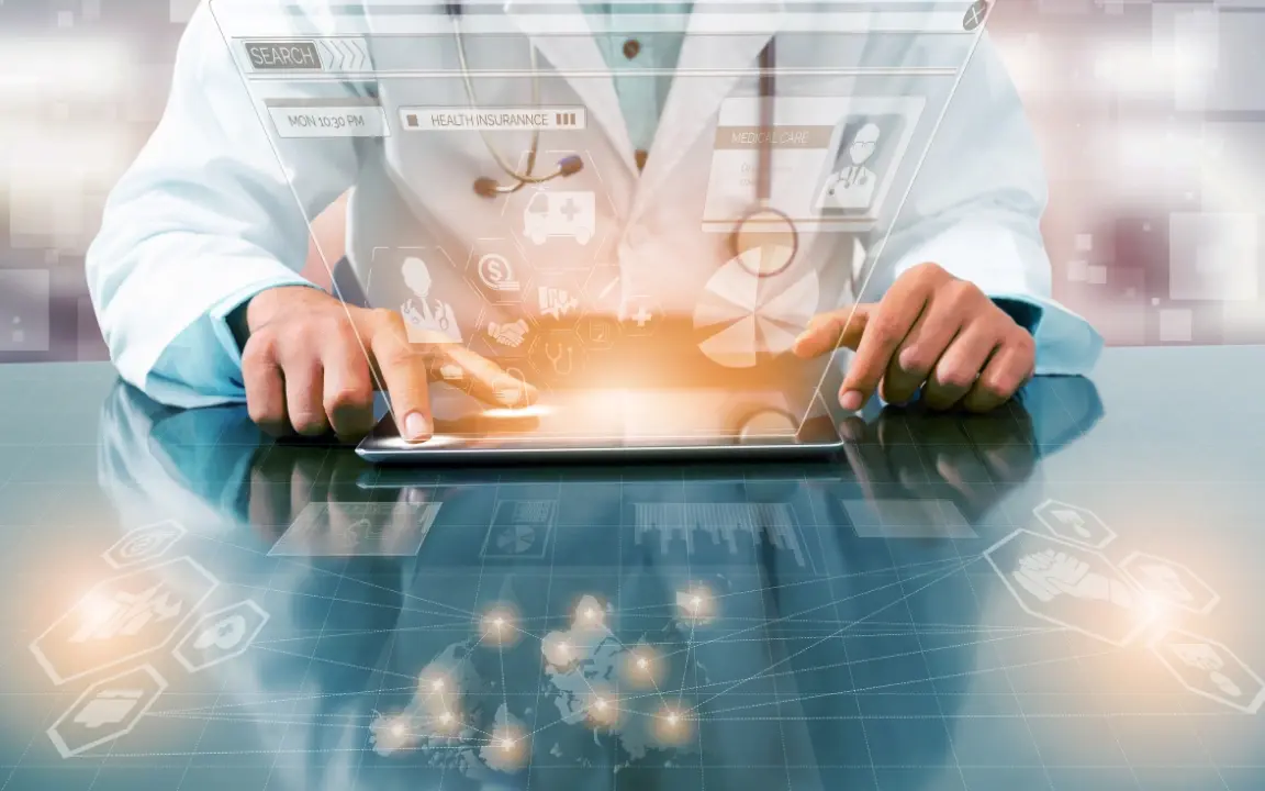 A clinician works on a tablet with glowing medical icons rising from the screen.